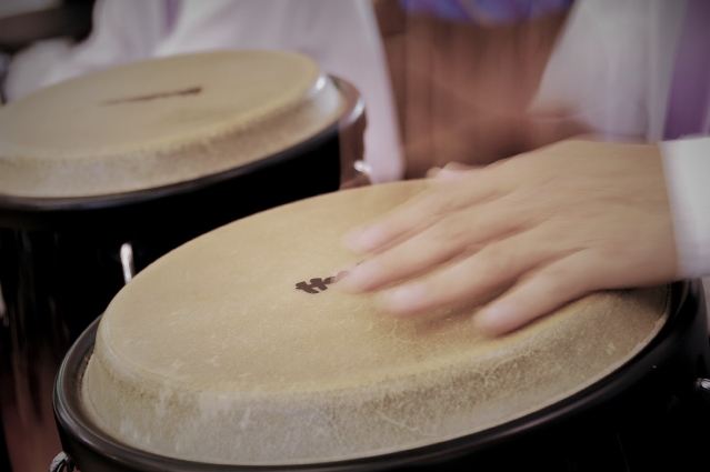 Close up photo of hand hitting a skin drum