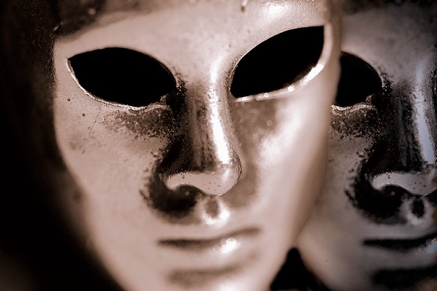 Close up photo of metallic human face mask