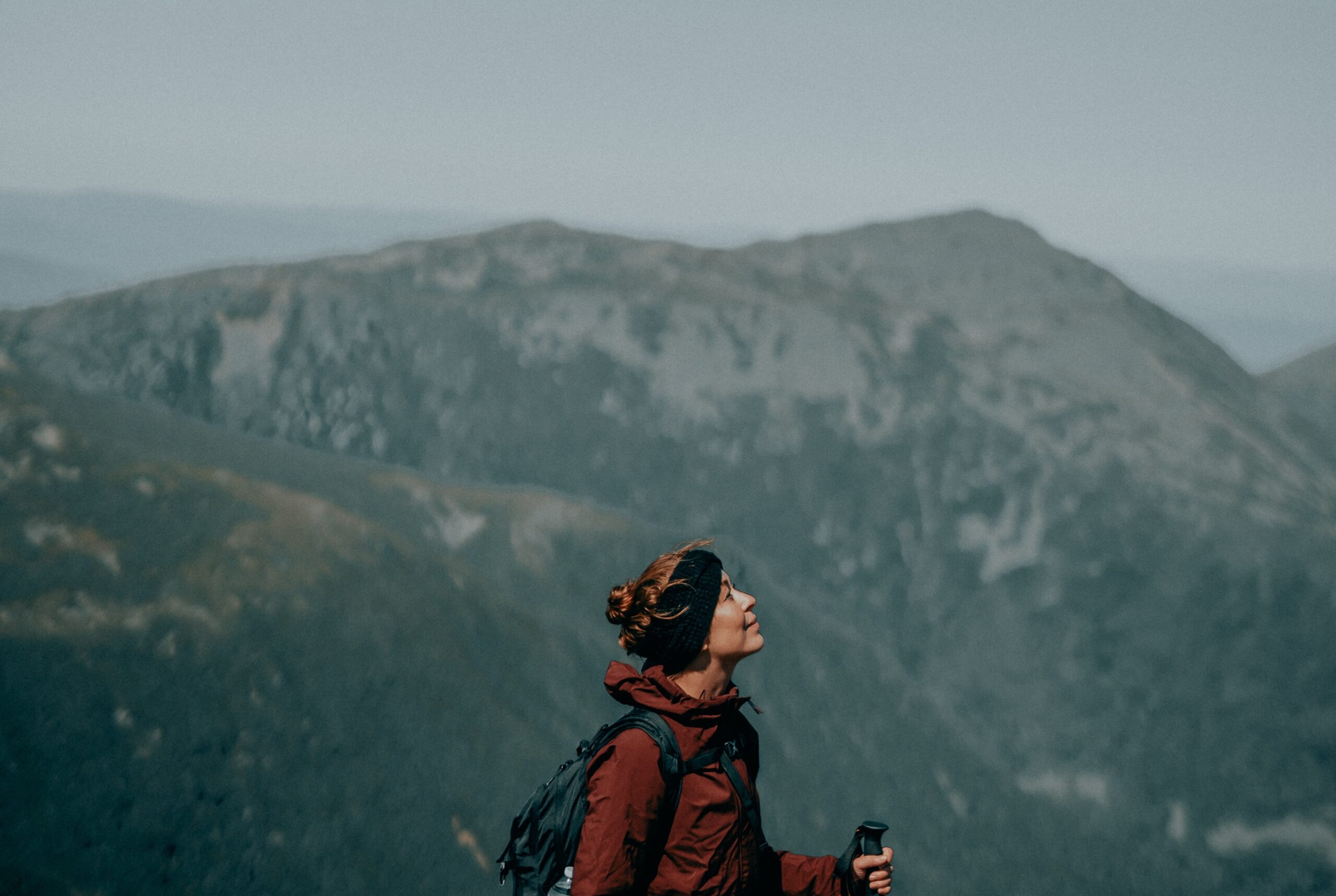 a mountain climber or hillwalker enjoying being outdoors