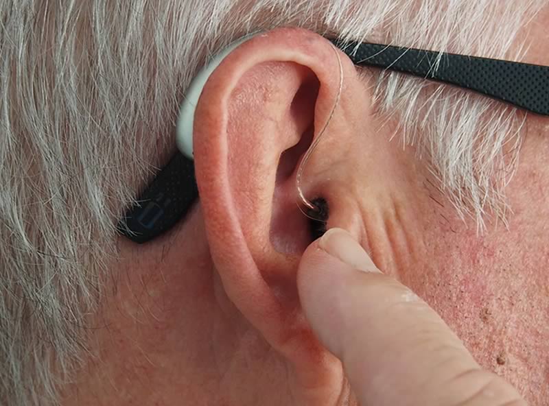 Close up of an ear with hearing aid