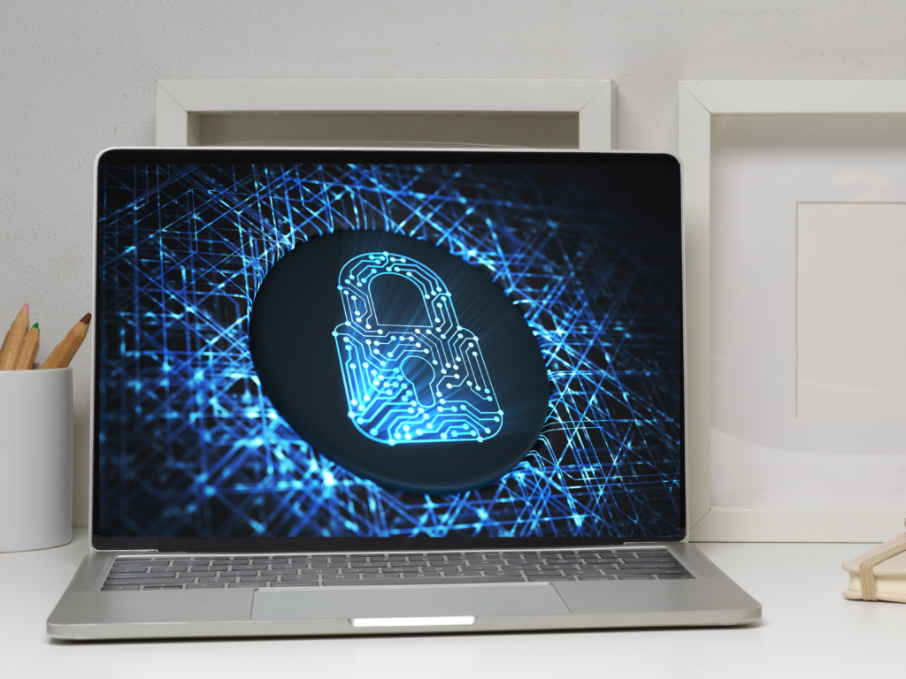 Photo of a laptop with a blue padlock on the screen - symbolising internet security