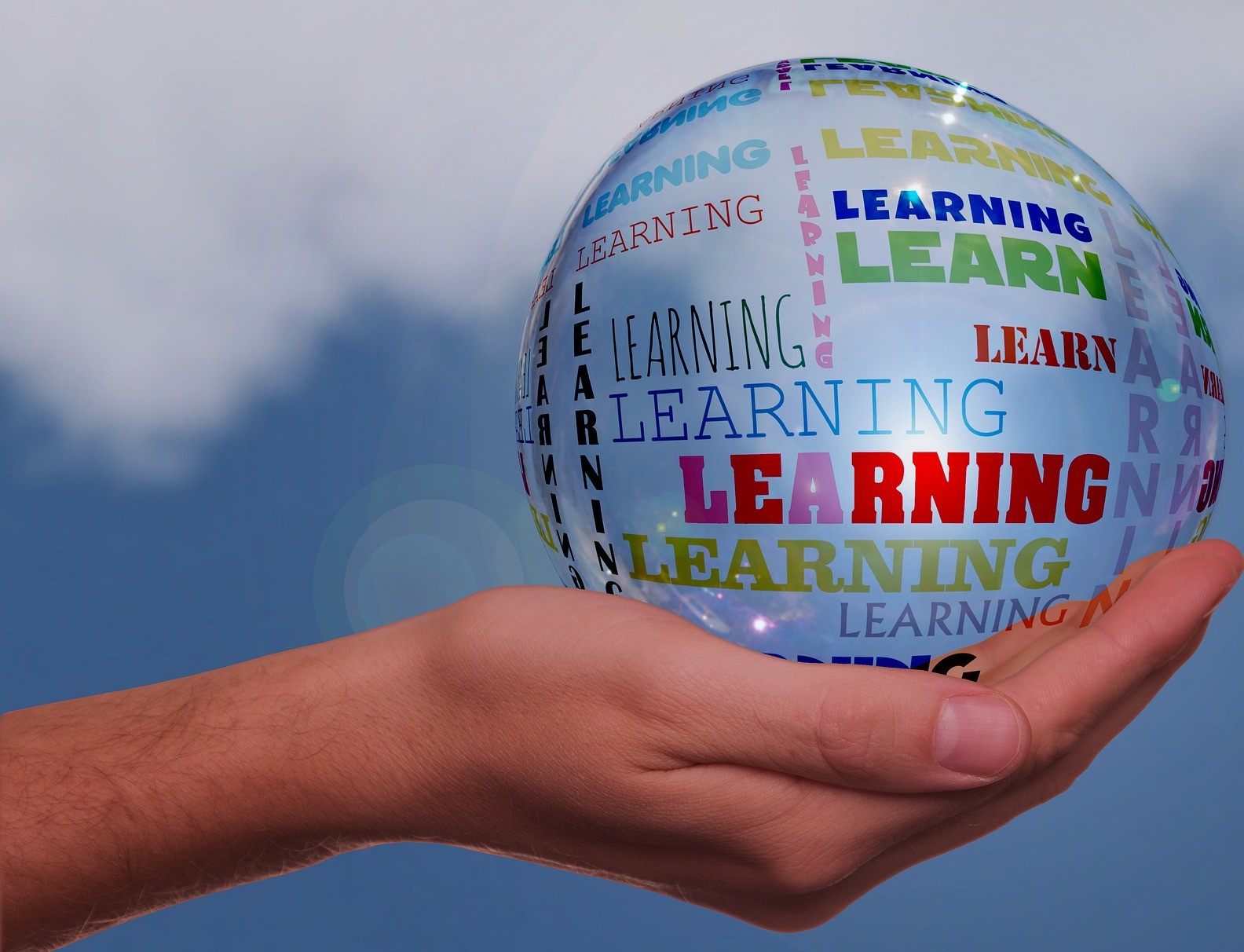 handing holding a crystal ball