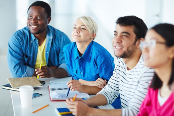 NHS staff around a meeting table