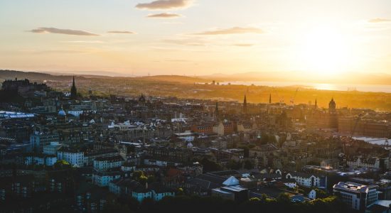Landscape photo of Edinburgh with the sun going down