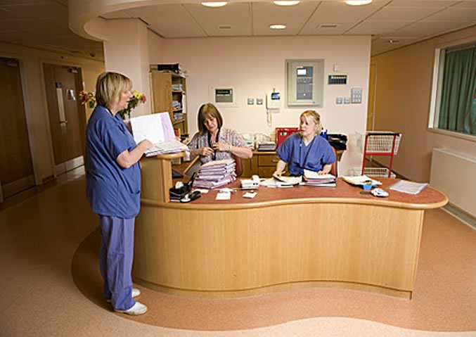 Nurse and hospital receptionists