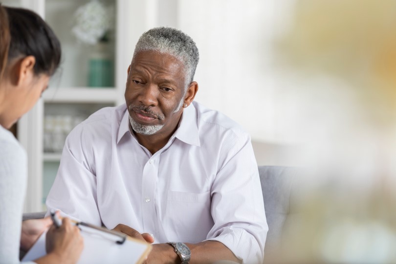 a man with a researcher