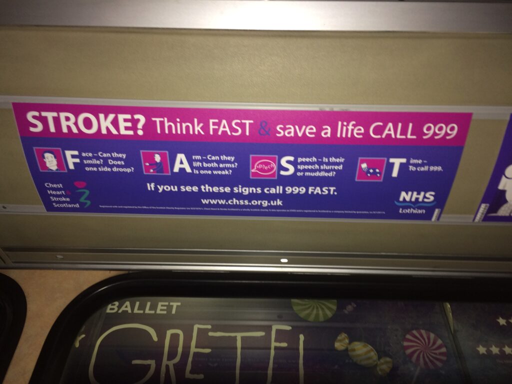 FAST poster displayed on a bus