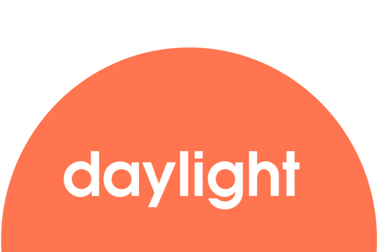 The word daylight, on an orange sun